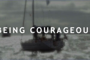 Being Courageous image with boat on water in background The Game Changers Inc Eric Boles coaching keynoting training
