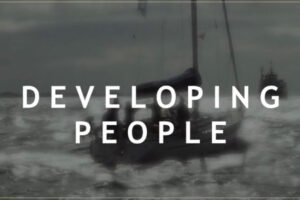 Developing People image with sailboat in background The Game Changers Inc Eric Boles coaching keynoting training